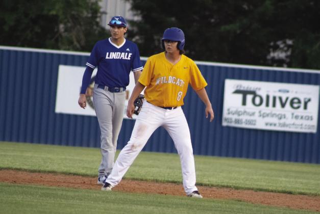 Kody Barclay (8) weighs his options on the basepaths during Game 1 of the Wildcats' Bi-District playoff series against Lindale Wednesday. Barclay batted 2/3 and scored a run in the Wildcats' 5-4 loss. Photo by DJ Spencer