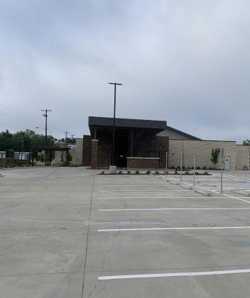 The new senior center offers plenty of paved parking, including handicap spots on both sides of the building. A covered awning will allow Meal A Day volunteersto pick up coolers for delivery regardless of the weather and center regulars can be enter and exit out of the rain.