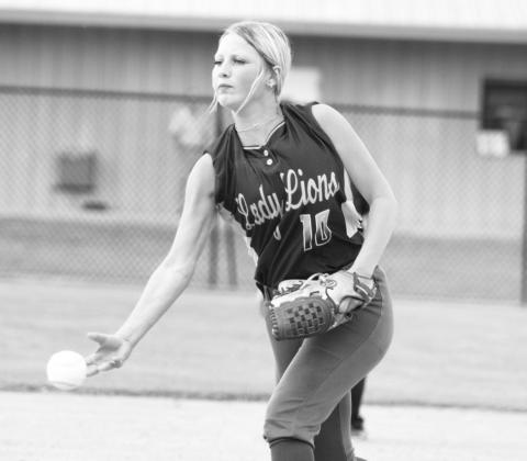 Senior Ryleigh Redar (10) delivers a pitch during the Lady Lions' game against Bloomburg last Wednesday. Redar was one of three Lady Lions that played in their final high school softball game in the Lady Lions' 4-2 loss. Photo by DJ Spencer