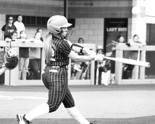 Gracie Thompson (42) takes a big cut off of a pitch during recent action. Thompson batted a combined 3/7, scored four runs, and recorded an RBI in the Lady Eagles' Bi-District playoff series against Linden-Kildare, helping the Lady Eagles win both games. Photo by DJ Spencer