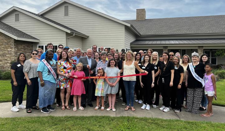 Carriage House Manor ribbon cutting