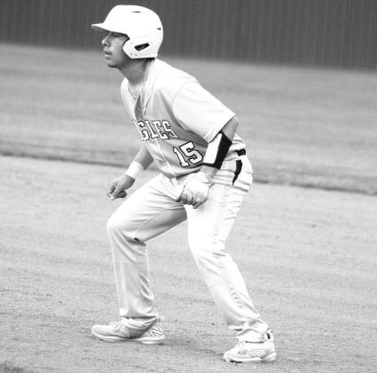 Adrian Chambly (15) weighs his options on the basepaths during the Eagles' game against Sulphur Bluff last Wednesday. Chambly batted a perfect 3/3 and recorded an RBI in the Eagles' 6-0 victory. Photo by DJ Spencer