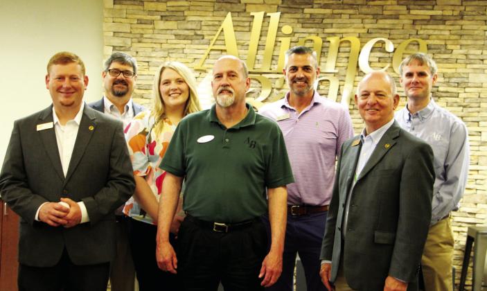Alliance Bank’s Business Lending Team, based at the downtown branch, includes (front row, left to right, Gary Clem and Jack Bridges, both lending vice-presidents, with Keith Shurtleff, market president-Hopkins County, at right; and (back row, left to right) Jason Thompson, senior vice-president-lending, and Rebecca McDaniel, Mike Jumper and John Campbell, all lending vice-presidents. Staff Photo by Tammy Vinson