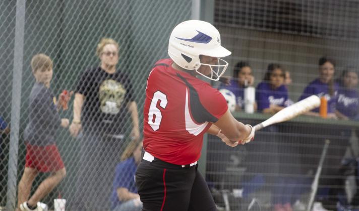 Senior Evie Fuentes-Perry (6) takes a big cut off of a pitch during recent home action. In what turned out to be her final high school softball game, Fuentes-Perry batted 2/4 and recorded four RBIs in the Lady Panthers' 7-6 loss in the Bi-District round of the playoffs. Photo by DJ Spencer