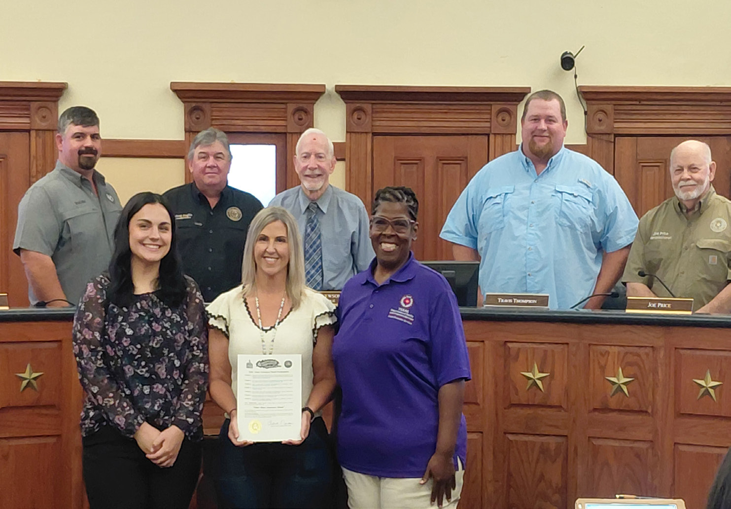 Hopkins County Commissioners Court presents a signed proclamation declaring June as Elder Abuse Awarness Month. Photo by Lexi Delarosa