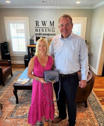 Chaney and Craig Johnson are sponsoring this gorgeous blue Chloe bag as a prize for the Hopkins County Health Care Foundation’s upcoming Designer Handbag Bingo. Proceeds of the event will be used to underwrite a free mammography clinic in October.