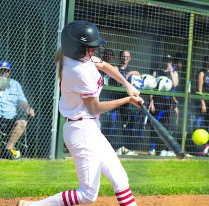 NICE CUT — Senior Sailan Adair (7) takes a big cut off of a pitch during the Lady Panthers' game against Bland Friday. In her final high school softball game, Adair batted 2/4 and scored two runs, helping the Lady Panthers to a 9-6 victory. Photo by DJ Spencer