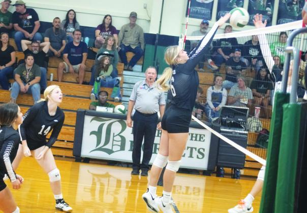 BIG ATTACK — Saylor Smith (6) attacks the ball during earlier road action. Smith came up with seven kills, two aces, two digs, and one block in the Lady Eagles' home sweep against Boles Tuesday. Photo by DJ Spencer