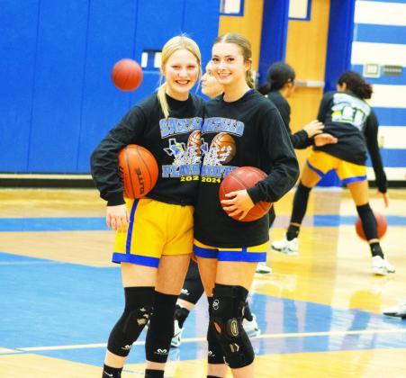 Ryleigh Redar (left) and Maysen Pipkin (right) smile for the camera during pregame warmups of their Bi-District playoff game Monday. The Lady Lions will play the Throckmorton Lady Greyhounds in the Area round. Photos by DJ Spencer
