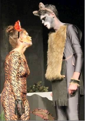 Tate Smith (right) as Akele and Aspen Mayhew as Shere Khan face off.
