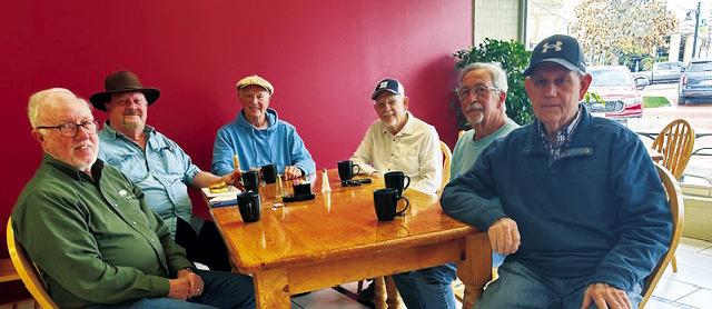 Good-natured conversation rules when the 9 a.m. coffee club gathers at Plain &amp; Fancy Sandwich Shoppe downtown. Super Tuesday voting was the topic on Tuesday, March 5. L. to R. Perry Altenbaumer, Joe Mack Gober, Pat Chase, Fred McCauley, Mike Mahand, and Mack Reed. Photo by Enola Gay Mathews