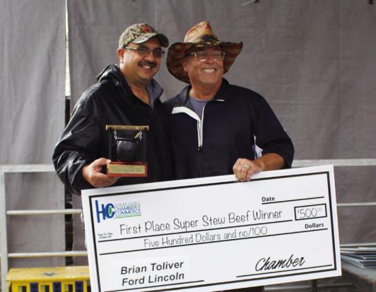 Cooks Steve Littelfield and Dwayne Sears, sponsored by Ben E. Keith, wprepared te first place in the super stew beef contest