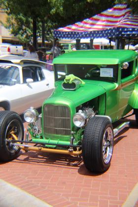 Kermit the Frog made an appearance on this bright green roadster at the 22-mile Cruise & Car Show Saturday at Celebration Plaza.