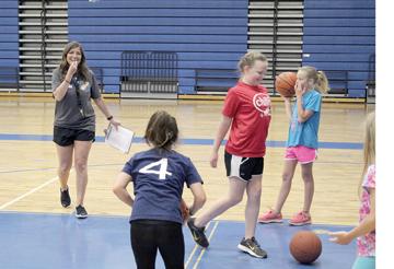 Sulphur Springs girls basketball coach Brittney Tisdell explains a drill during day one of the Ladycat Basketball Camp. Approximately 20 campers attended this year’s edition, where they learned technical skills along with self-discipline and individual and team concepts.
