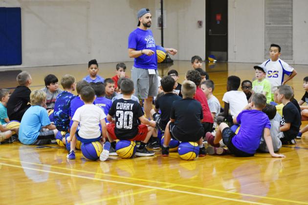 Wildcat head boys basketball coach Clark Cipoletta addresses the campers at the Sulphur Springs Wildcat Basketball Camp. Coach Cipoletta said approximately 80 campers attended the two sessions: one for students in kindergarten-fifth grades and one for students in sixth-ninth grades.