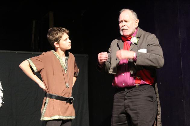 Brave hero Atreyu, played by Nathan Bilyieu, speaks with Professor Engywook, played by John D’Avignon, to figure out how to find the Southern Oracle to save the life of the Childlike Empress, ruler of Fantastica. Staff photos by Tammy Vinson