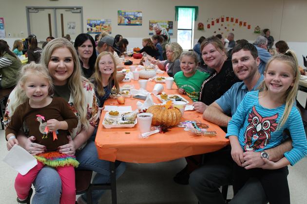 Miller Grove school board member Clark May (second from left) enjoys Thanksgiving luncheon with his family, daughters Addison, Brooklyn and Emma, sister Amanda and her daughters, Demi and Kalea, and mother Karen. Staff photo by Taylor Nye