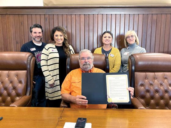 Cypress Basin Hospice staff pictured with City of Sulphur Springs Mayor Norman Sanders presenting the 2019 National Hospice Month Proclamation. Courtesy/ Cypress Basin Hospice