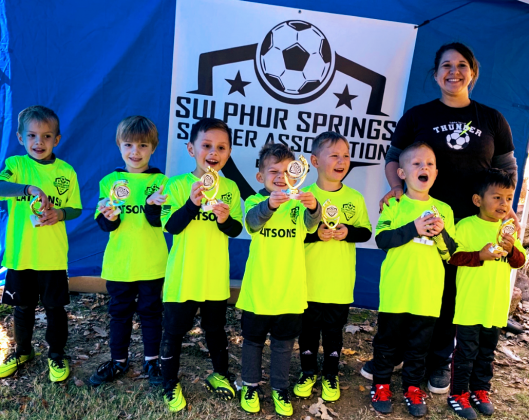 The Under 6 Neon Yellow Team was coached by Cody and Tonja Williams and sponsored by Latsons.