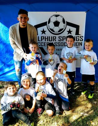 The Under 6 White Team was coached by Bryan Roque.