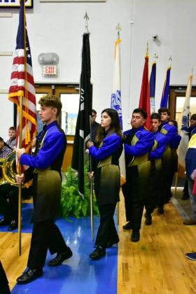 The Sulphur Springs High School band members carry the U.S. flag ahead of the flags representing the different branches of the U.S. military at the school’s patriotic program held in their gym on Veterans Day. Courtesy/SSISD, Cindy Welch