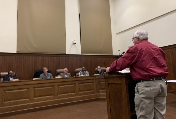Northeast Texas Farmers' Co-Op general manager Brad Johnson addresses city council during public comments