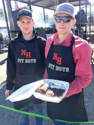 Cade Kirby (left) and Rylan Sills competed at the Texas High School BBQ Competition in White Oak Saturday. Courtesy/North Hopkins ISD