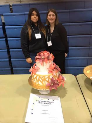 Kimberly Hernandez (left), junior, and Natalie Thrash, sophomore, of the Sulphur Springs High School Culinary Arts program had a perfect score with their confectionery creation at regional competition in Waco last weekend but didn’t advance to the state level due to a small technicality in their paperwork. Courtesy/Pam Carter, SSHS