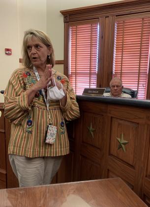County tax assessor-collector Debbie Pogue Mitchell discusses special taxing units with the commissioners/ Staff photo by Taylor Nye