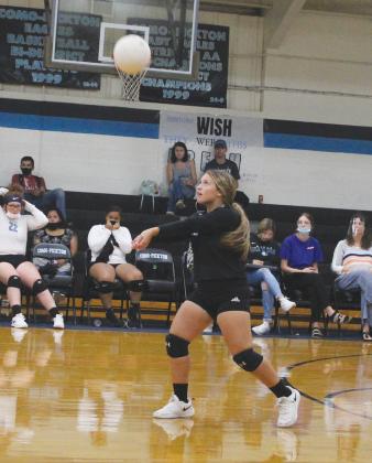 Chloe Romero returns a serve in earlier action this season for the Lady Eagles. Romero led the team with 11 digs in their road win over Yantis on Tuesday. She also had four aces. Staff photo by Tyler Lennon
