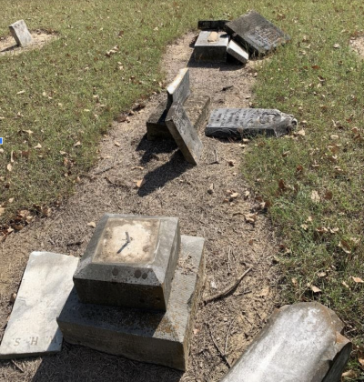 Grave markers were knocked over at Aiguier Cemetery on the night of Oct. 21/ Courtesy HCSO