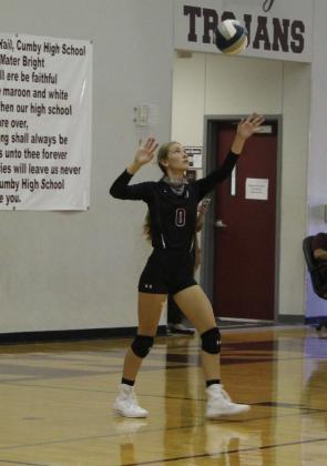 Sophomore Ashlyn Hudson attempts a serve in the Cumby Lady Trojans 3-0 win over Fruitvale Tuesday. Hudson opened the match by scoring the first three points of the game, setting the tone for the rest of the match. Staff photo by Tyler Lennon