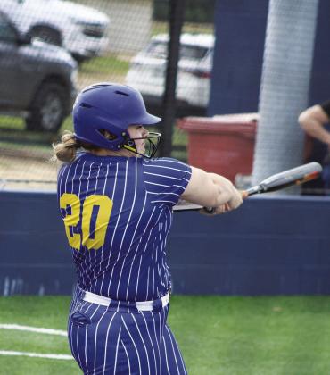 Reese Ragan (20) takes a big cut off of a pitch during the Lady Wildcats' game against Paris Wednesday. Ragan batted 1/3, recorded three RBIs, and scored two runs in the Lady Wildcats' 23-0 victory. Photos by DJ Spencer