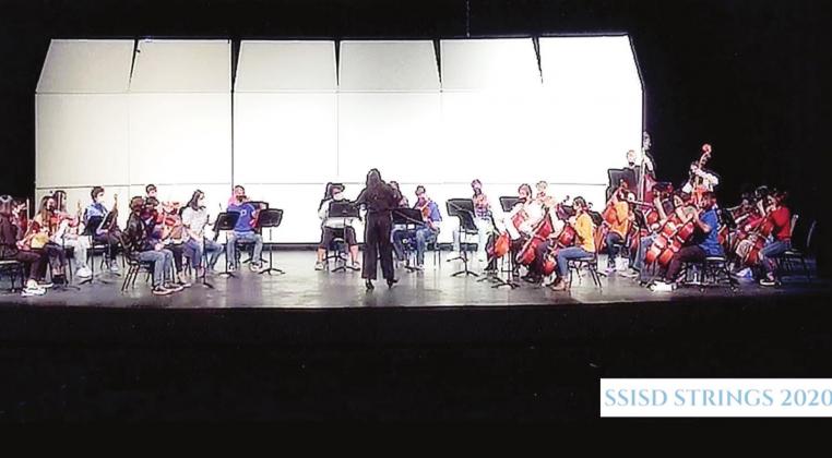 Sulphur Springs High School String Orchestra performs "Winter Palace" during the program's virtual winter concert. The orchestra is led by director Hannah Kirby. Screenshot