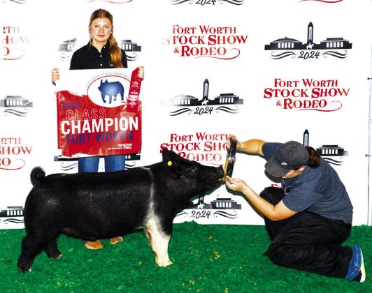 Kindall Shackelford finished second in cross breed competition with her barrow swine.