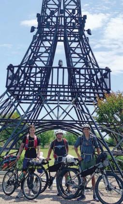 In front of the Paris, Texas Eiffel Tower, (from left) Landon Thornton, Rhett Reid and Eli Sellers pose on their 130-mile bike ride. Courtesy