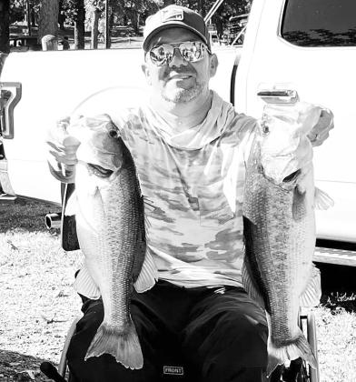 TOURNAMENT CHAMPION — Last November, Winans won a bass club tournament at Cedar Creek while fishing from the back deck. Winans and his partner started the morning casting at the lake’s dam, the same spot where he nearly lost his life a year earlier. Photo courtesy of Brady Winan