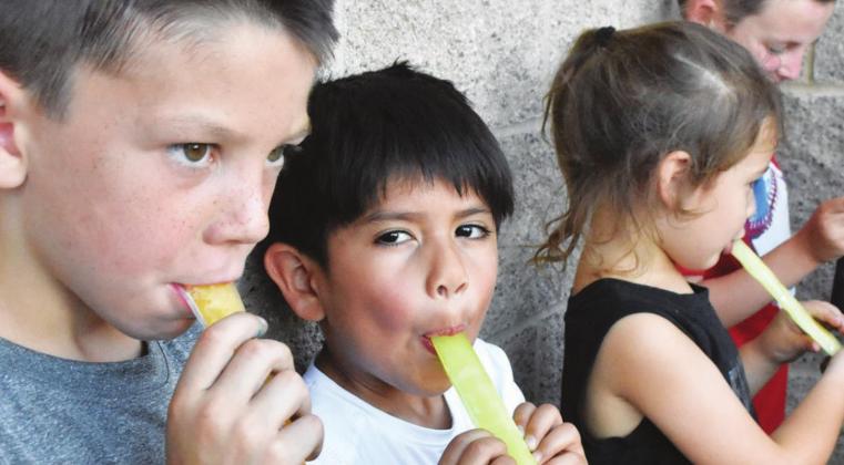 Popsicles, a frozen ice treat, were given out to Sulphur Springs soccer camp participants each evening at the camp. The children, numbering more than 150, welcomed the break and the time to visit with friends outside of the multi-purpose building.