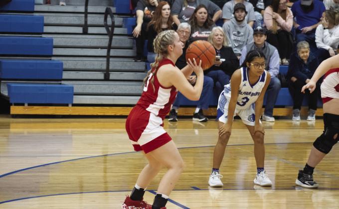FREE POINTS — Daylee Fite (3) shoots a free throw during the Lady Panthers' game against Sulphur Bluff Monday. Fite scored 12 points in the Lady Panthers' 57-45 victory, including a trio of three-pointers. PhotobyDJSpencer