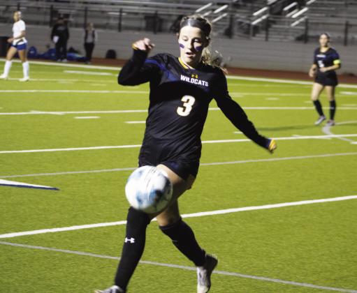 Rowan Faircloth (3) goes after the ball during the Lady Wildcats' Bi-District playoff game against Chapel Hill Tuesday. Faircloth scored two goals in the Lady Wildcats' 5-1 victory. Photo by DJ Spencer
