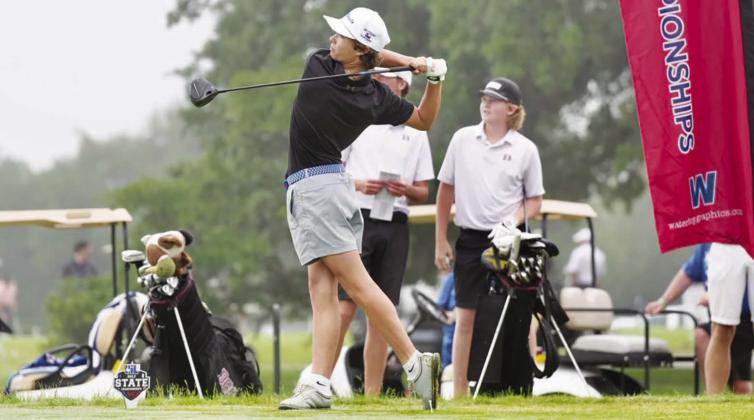 Nick Burney drives the ball far during the first day of the State Golf meet. Burney scored a 76 on Day 1, and then a 79 on Day 2, giving him an overall score of 172. Photo by Dinh Tran