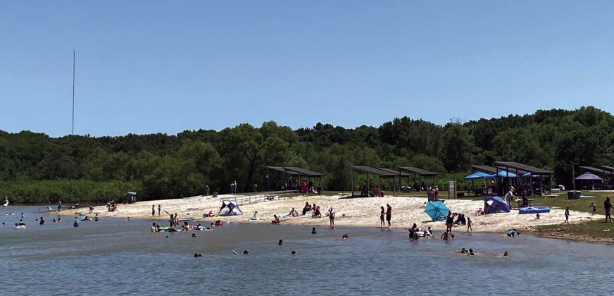 People take advantage of the outdoors at Cooper Lake State Parks. The park is located on the banks of Jim Chapman Lake, where watersports abound. Almost 200 overnight camping sites, ranging from cool cabins to primitive tent sites, are available at CLSP..