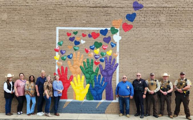 SART MURAL — We rise up by lifting others