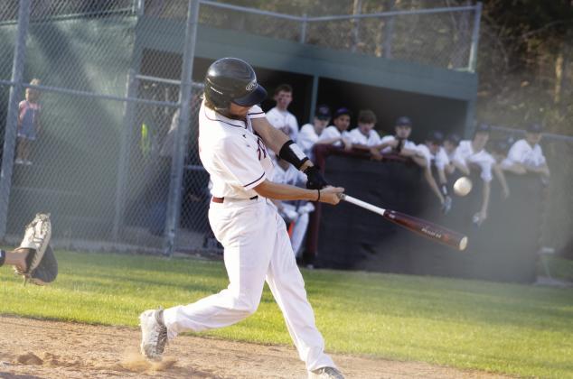 Matt Liston (7) hits the ball during earlier home action. Liston was one of only two Trojans to record a hit in Cumby's 11-1 road loss to Alba-Golden Tuesday. Photo by DJ Spencer