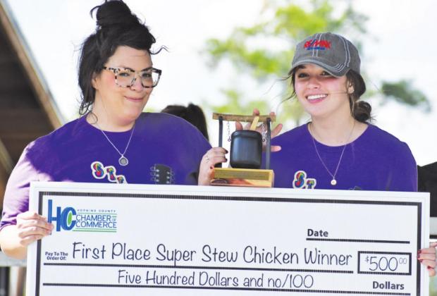 Kylie Smith and Katey Brown with Financial Solutions won first place in the Super Stew Chicken category.