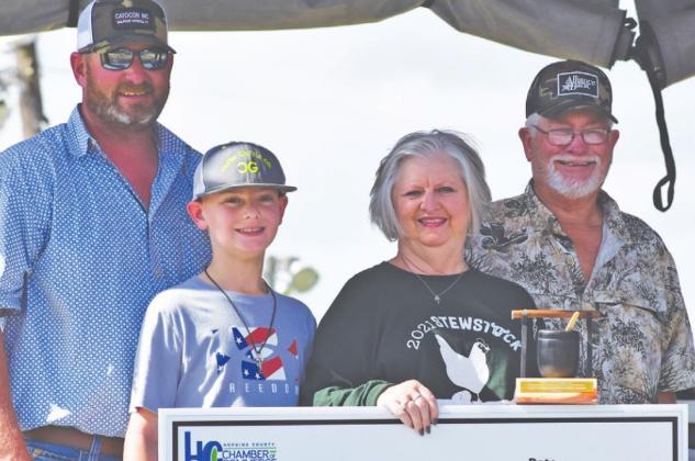 Brent McClendon and Tonya and James Ross with Alliance Bank won the Super Stew Beef category.