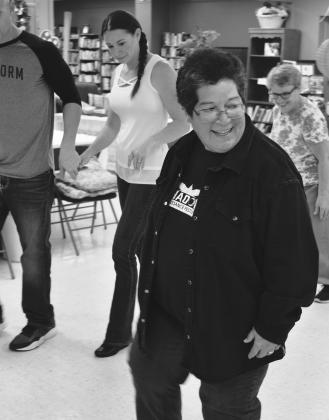 BOOT SCOOTING — Marion Cox, (front) is shown leading a recent group of line dancing students. The newly added class is scheduled for 1-2 p.m. the second and fourth Wednesday of each month at the Sulphur Springs Senior Citizen Center located at 150 Martin Luther King Jr. Drive. Staff photo by Don Wallace