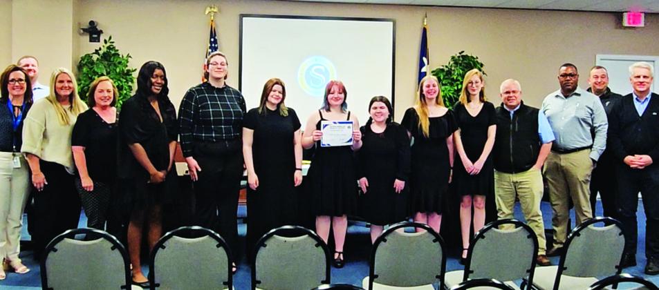 SSISD board members recognized a seven-member vocal ensemble at Monday's schoold board meeting. All seven students double-qualified to compete at the state competition in late May. Staff photo by Tammy Vinson