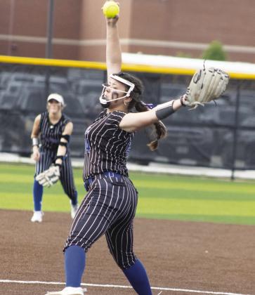 Hannah Speed (14) delivers a pitch during the Lady Wildcats' Area playoff game against Ford Friday. Speed earned the victory in the circle, tallying seven strikeouts.