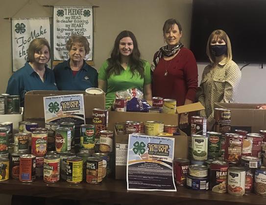 WORTHY CAUSE — The 2022 Souper Bowl of Caring campaign brought in more than 500 pounds of food. Pictured are representatives from Cumby Food Bank, Hopkins County 4-H and Alliance Bank. Submitted photo